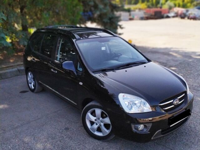 Чорний Кіа Каренс, об'ємом двигуна 2 л та пробігом 168 тис. км за 9300 $, фото 1 на Automoto.ua