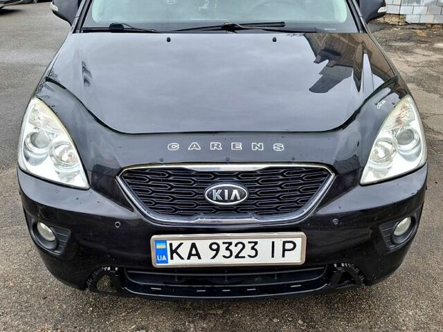 Чорний Кіа Каренс, об'ємом двигуна 2 л та пробігом 228 тис. км за 6500 $, фото 1 на Automoto.ua