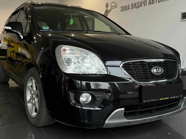 Черный Киа Каренс, объемом двигателя 1.6 л и пробегом 269 тыс. км за 7500 $, фото 1 на Automoto.ua