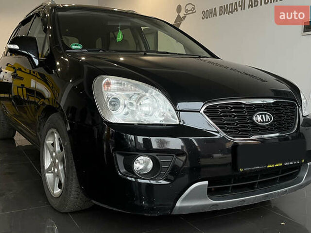 Чорний Кіа Каренс, об'ємом двигуна 1.58 л та пробігом 269 тис. км за 7500 $, фото 1 на Automoto.ua