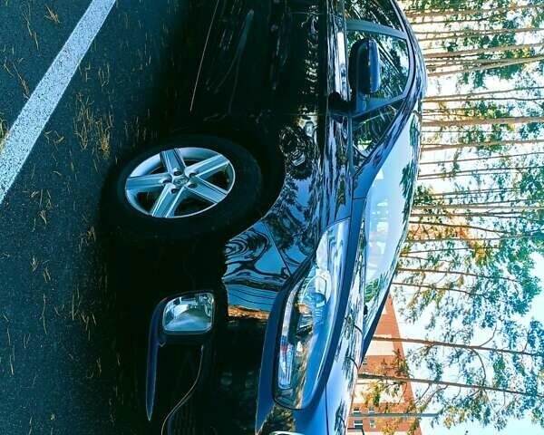 Чорний Кіа Каренс, об'ємом двигуна 1.7 л та пробігом 314 тис. км за 9500 $, фото 1 на Automoto.ua