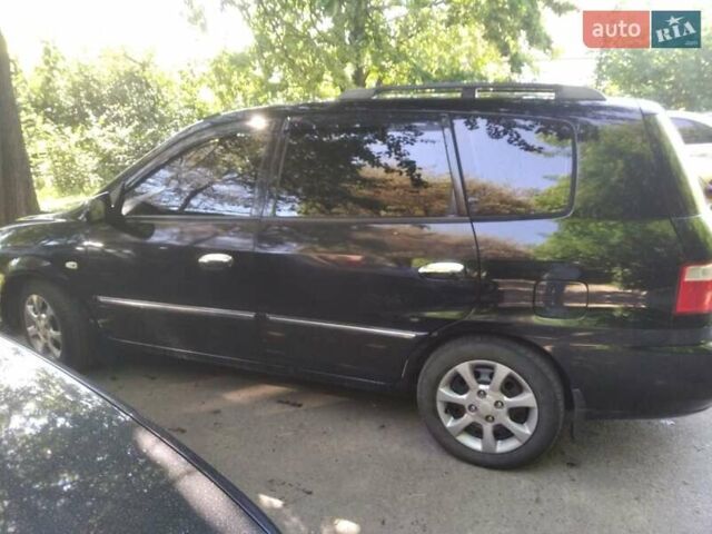 Киа Каренс, объемом двигателя 2 л и пробегом 310 тыс. км за 5835 $, фото 1 на Automoto.ua