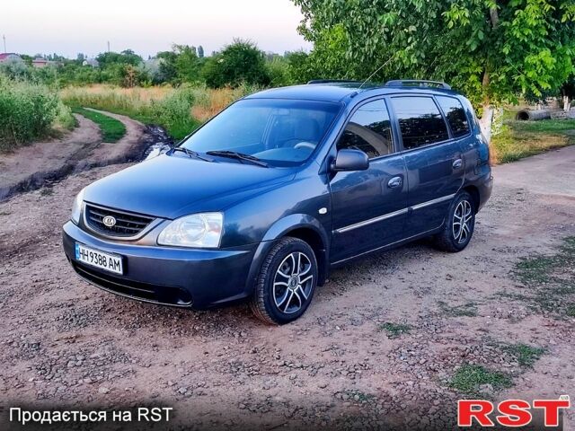 Сірий Кіа Каренс, об'ємом двигуна 1.6 л та пробігом 244 тис. км за 4200 $, фото 1 на Automoto.ua