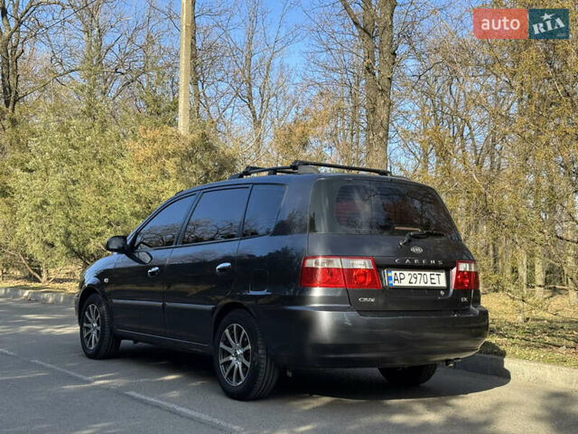 Серый Киа Каренс, объемом двигателя 1.99 л и пробегом 580 тыс. км за 4600 $, фото 1 на Automoto.ua