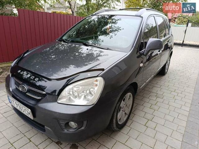 Сірий Кіа Каренс, об'ємом двигуна 2 л та пробігом 296 тис. км за 5600 $, фото 1 на Automoto.ua