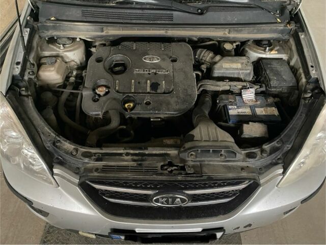 Серый Киа Каренс, объемом двигателя 2 л и пробегом 305 тыс. км за 2800 $, фото 1 на Automoto.ua