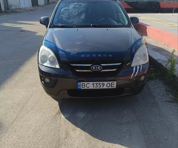 Серый Киа Каренс, объемом двигателя 2 л и пробегом 300 тыс. км за 6300 $, фото 1 на Automoto.ua