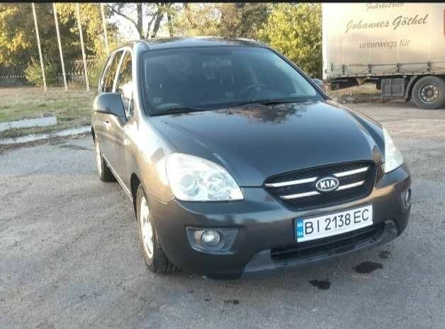 Серый Киа Каренс, объемом двигателя 2 л и пробегом 198 тыс. км за 5800 $, фото 1 на Automoto.ua