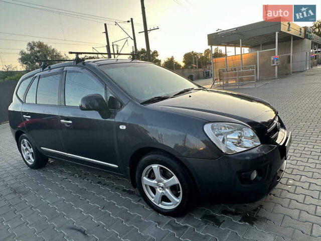 Сірий Кіа Каренс, об'ємом двигуна 2 л та пробігом 300 тис. км за 6750 $, фото 1 на Automoto.ua