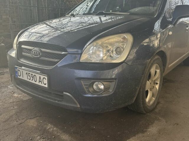 Синий Киа Каренс, объемом двигателя 2 л и пробегом 270 тыс. км за 5600 $, фото 1 на Automoto.ua