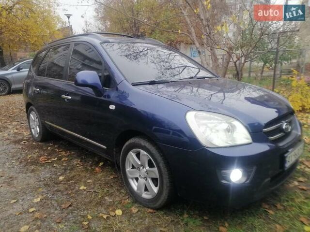 Синий Киа Каренс, объемом двигателя 2 л и пробегом 244 тыс. км за 6000 $, фото 1 на Automoto.ua