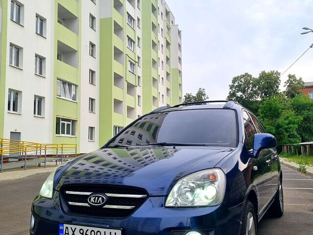 Синій Кіа Каренс, об'ємом двигуна 2 л та пробігом 236 тис. км за 5400 $, фото 1 на Automoto.ua