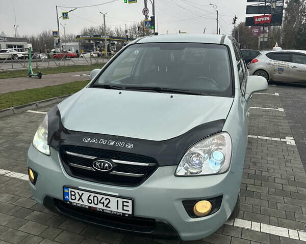 Синій Кіа Каренс, об'ємом двигуна 2 л та пробігом 190 тис. км за 5950 $, фото 1 на Automoto.ua