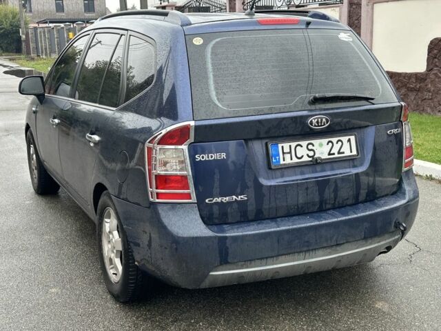 Синій Кіа Каренс, об'ємом двигуна 2 л та пробігом 280 тис. км за 2600 $, фото 1 на Automoto.ua