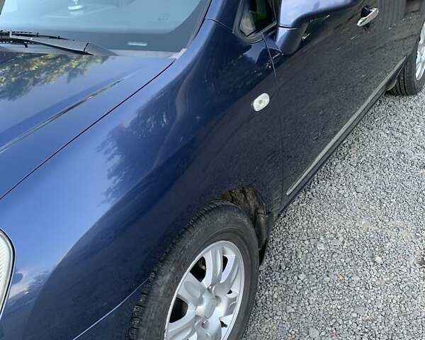 Синий Киа Каренс, объемом двигателя 2 л и пробегом 234 тыс. км за 6500 $, фото 1 на Automoto.ua