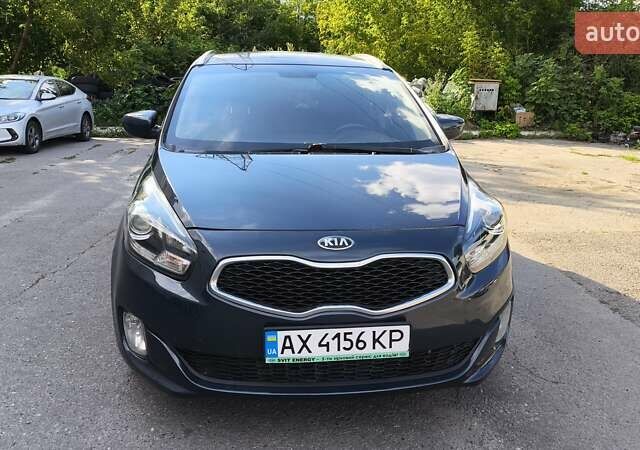 Синій Кіа Каренс, об'ємом двигуна 2 л та пробігом 228 тис. км за 10200 $, фото 1 на Automoto.ua