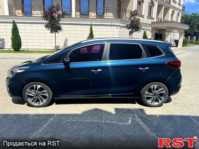 Синій Кіа Каренс, об'ємом двигуна 2 л та пробігом 275 тис. км за 16000 $, фото 1 на Automoto.ua