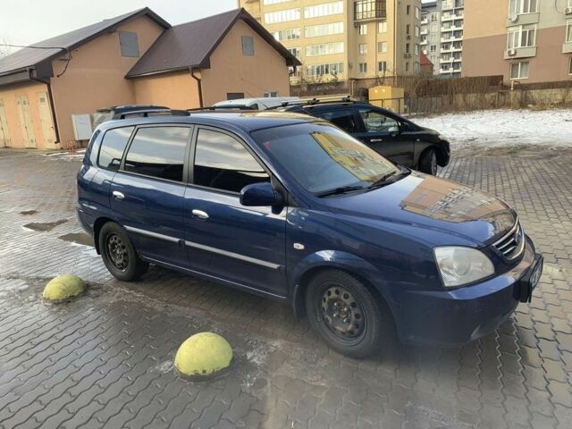 Синій Кіа Каренс, об'ємом двигуна 2 л та пробігом 196 тис. км за 1600 $, фото 1 на Automoto.ua