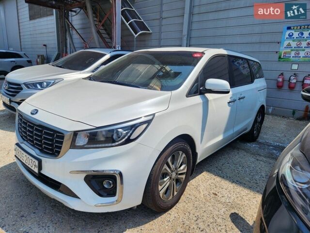 Белый Киа Карнивал, объемом двигателя 2.2 л и пробегом 207 тыс. км за 16500 $, фото 1 на Automoto.ua