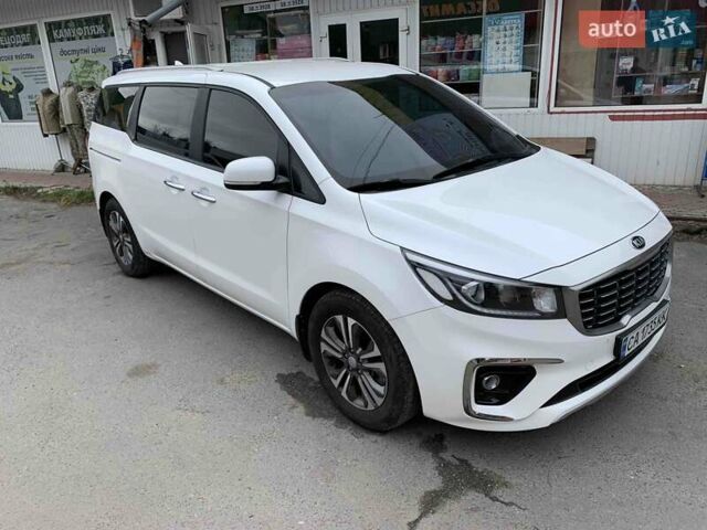Белый Киа Карнивал, объемом двигателя 2.2 л и пробегом 144 тыс. км за 24999 $, фото 1 на Automoto.ua