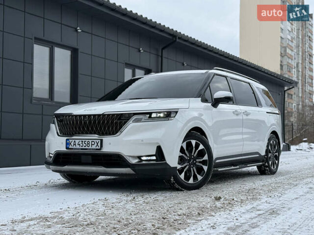 Белый Киа Карнивал, объемом двигателя 2.15 л и пробегом 12 тыс. км за 43900 $, фото 1 на Automoto.ua