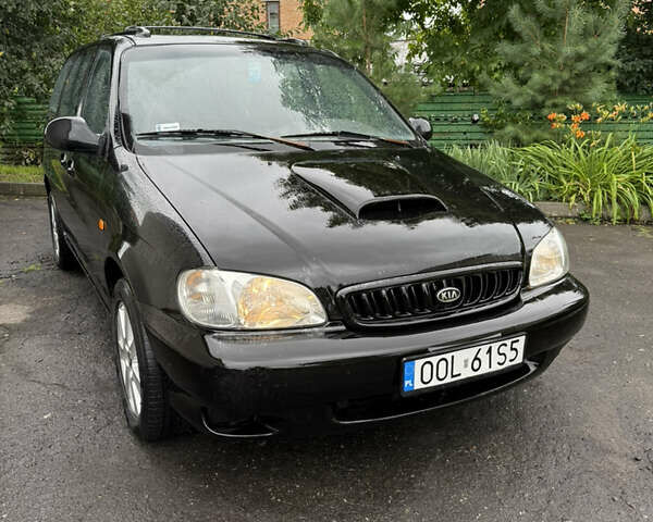 Черный Киа Карнивал, объемом двигателя 2.9 л и пробегом 250 тыс. км за 2100 $, фото 1 на Automoto.ua
