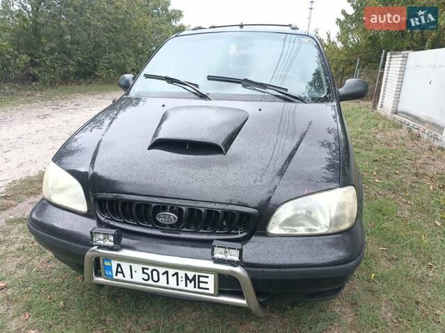 Черный Киа Карнивал, объемом двигателя 2.9 л и пробегом 320 тыс. км за 2200 $, фото 1 на Automoto.ua