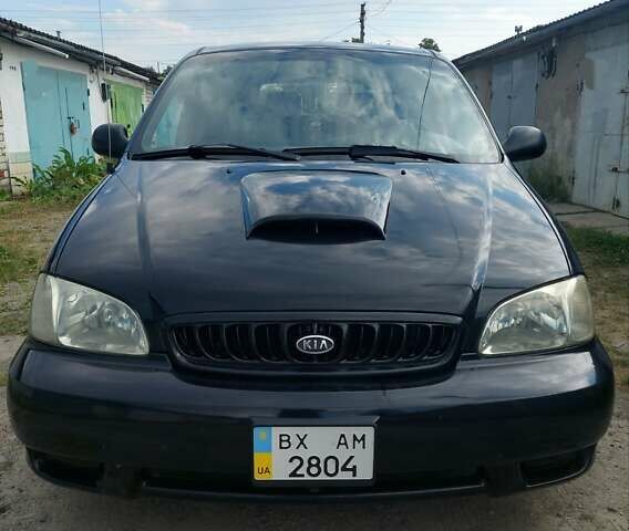 Черный Киа Карнивал, объемом двигателя 2.9 л и пробегом 294 тыс. км за 4000 $, фото 1 на Automoto.ua