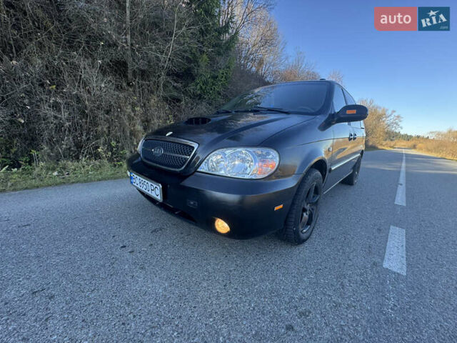 Черный Киа Карнивал, объемом двигателя 2.9 л и пробегом 245 тыс. км за 3250 $, фото 1 на Automoto.ua