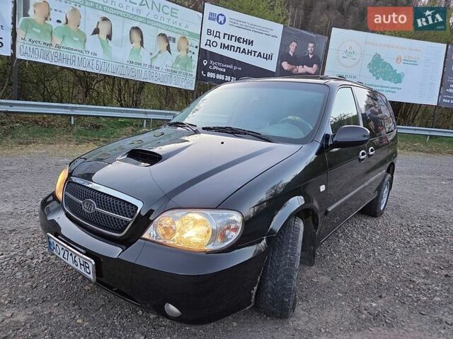 Черный Киа Карнивал, объемом двигателя 2.9 л и пробегом 299 тыс. км за 4400 $, фото 1 на Automoto.ua