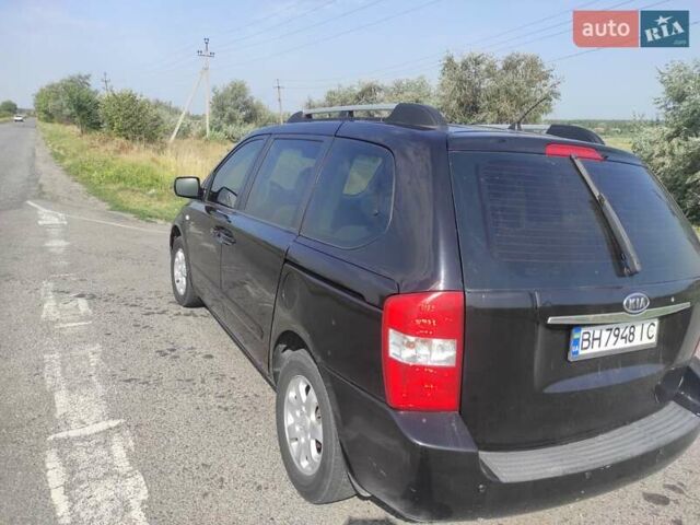 Черный Киа Карнивал, объемом двигателя 2.9 л и пробегом 288 тыс. км за 4999 $, фото 1 на Automoto.ua