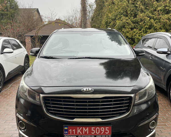 Черный Киа Карнивал, объемом двигателя 2.2 л и пробегом 220 тыс. км за 14100 $, фото 1 на Automoto.ua