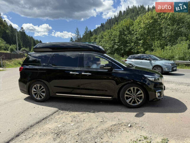 Черный Киа Карнивал, объемом двигателя 2.2 л и пробегом 215 тыс. км за 23500 $, фото 1 на Automoto.ua