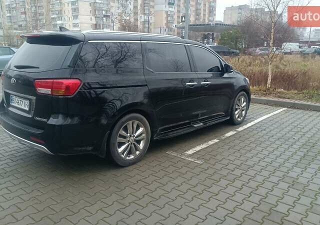 Черный Киа Карнивал, объемом двигателя 2.2 л и пробегом 300 тыс. км за 28800 $, фото 1 на Automoto.ua
