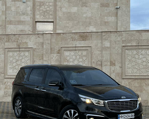Черный Киа Карнивал, объемом двигателя 2.2 л и пробегом 149 тыс. км за 23500 $, фото 1 на Automoto.ua