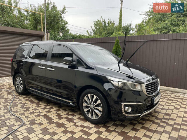 Чорний Кіа Карнівал, об'ємом двигуна 2.2 л та пробігом 150 тис. км за 23500 $, фото 1 на Automoto.ua