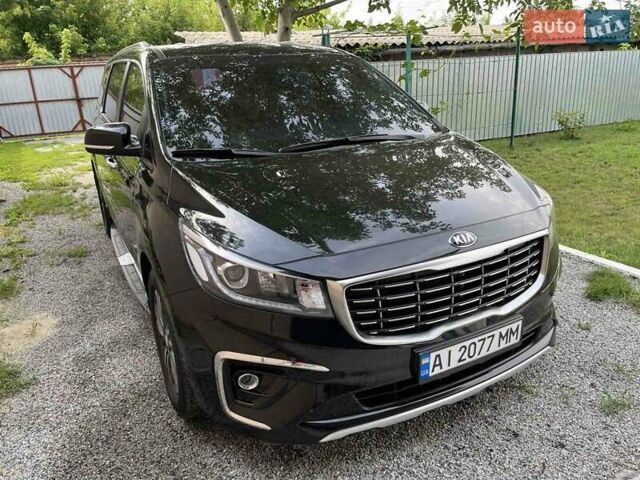 Черный Киа Карнивал, объемом двигателя 2.2 л и пробегом 149 тыс. км за 29900 $, фото 1 на Automoto.ua