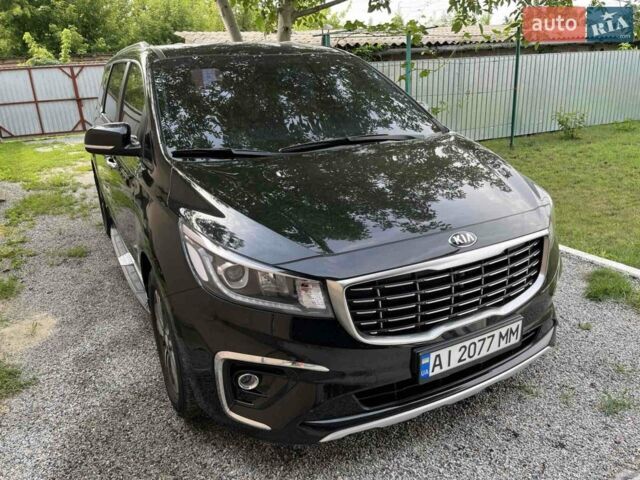 Черный Киа Карнивал, объемом двигателя 2.2 л и пробегом 149 тыс. км за 26800 $, фото 1 на Automoto.ua