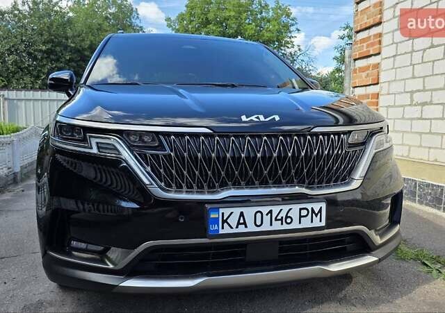 Черный Киа Карнивал, объемом двигателя 2.15 л и пробегом 106 тыс. км за 41000 $, фото 1 на Automoto.ua