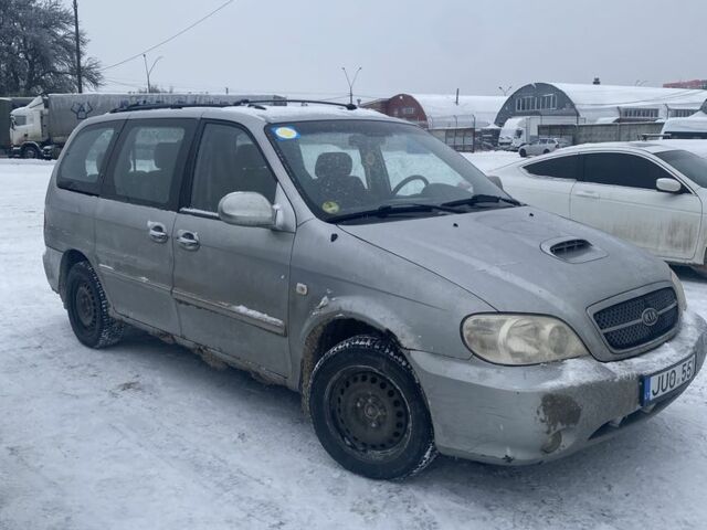 Серый Киа Карнивал, объемом двигателя 2.9 л и пробегом 250 тыс. км за 2000 $, фото 1 на Automoto.ua