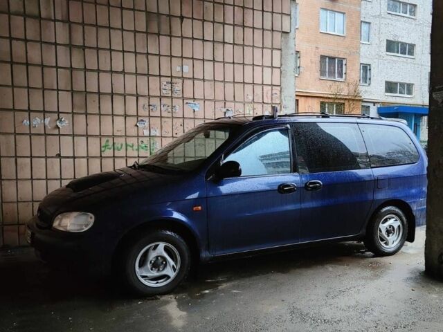 Синий Киа Карнивал, объемом двигателя 0 л и пробегом 320 тыс. км за 2496 $, фото 1 на Automoto.ua