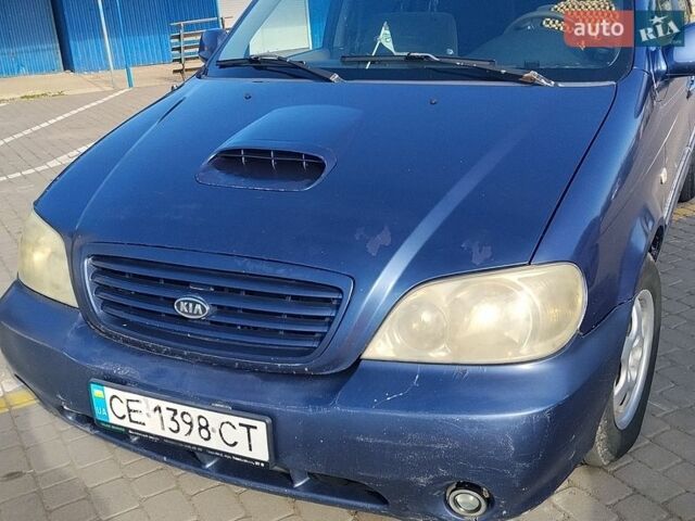 Синий Киа Карнивал, объемом двигателя 2.9 л и пробегом 275 тыс. км за 2000 $, фото 1 на Automoto.ua