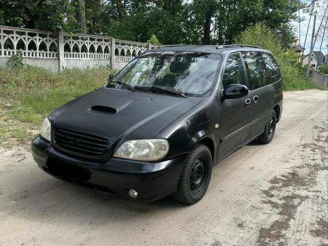 Синий Киа Карнивал, объемом двигателя 2.9 л и пробегом 227 тыс. км за 1800 $, фото 1 на Automoto.ua