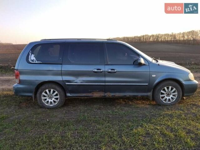 Синий Киа Карнивал, объемом двигателя 2.9 л и пробегом 240 тыс. км за 2450 $, фото 1 на Automoto.ua