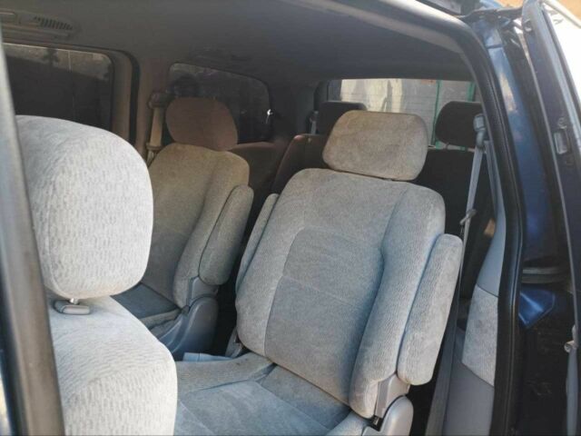 Синий Киа Карнивал, объемом двигателя 2.5 л и пробегом 267 тыс. км за 3500 $, фото 1 на Automoto.ua