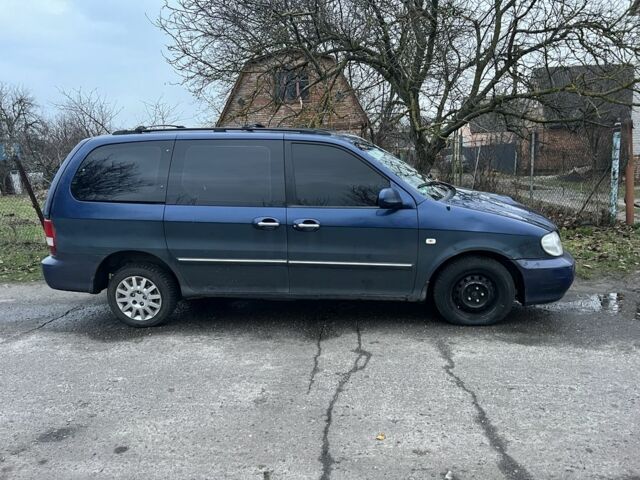 Синій Кіа Карнівал, об'ємом двигуна 2.9 л та пробігом 260 тис. км за 2900 $, фото 1 на Automoto.ua