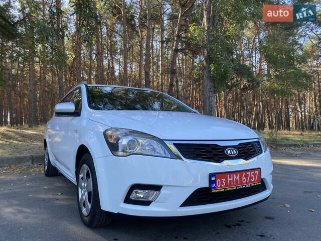 Білий Кіа Сід, об'ємом двигуна 1.6 л та пробігом 235 тис. км за 7500 $, фото 1 на Automoto.ua