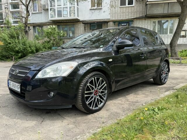Чорний Кіа Сід, об'ємом двигуна 2 л та пробігом 220 тис. км за 7823 $, фото 1 на Automoto.ua