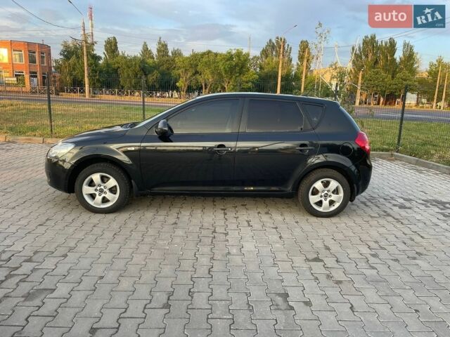 Черный Киа Сид, объемом двигателя 1.4 л и пробегом 165 тыс. км за 4950 $, фото 1 на Automoto.ua