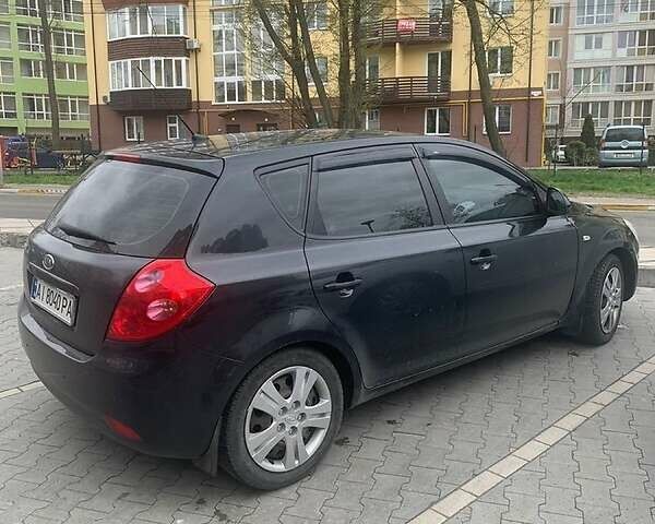 Черный Киа Сид, объемом двигателя 1.4 л и пробегом 185 тыс. км за 5700 $, фото 1 на Automoto.ua